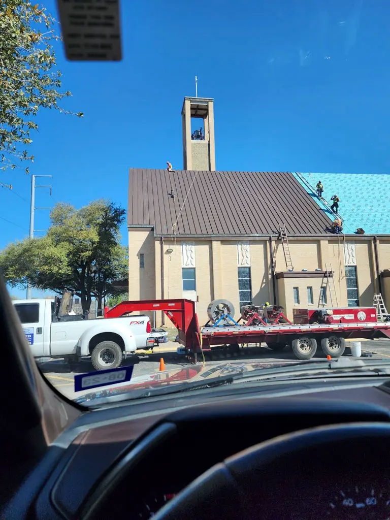 Metal roof replacement of a church.